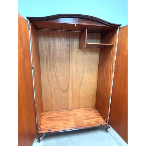 18 - A vintage walnut veneered double wardrobe;191cm high, 121cm width, 55cm depth.