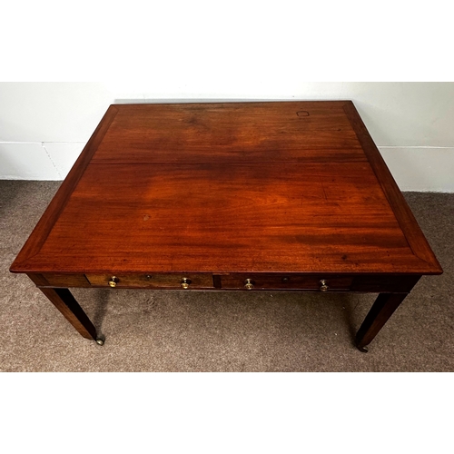 20 - A George III mahogany rectangular Library/ dining table, circa 1800, the oblong top (loose) with cle... 