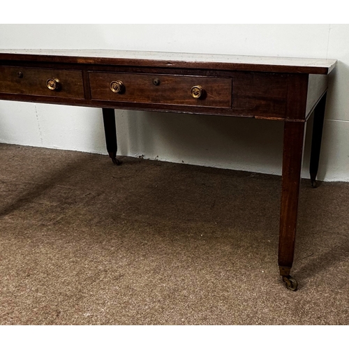 20 - A George III mahogany rectangular Library/ dining table, circa 1800, the oblong top (loose) with cle... 