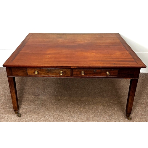 20 - A George III mahogany rectangular Library/ dining table, circa 1800, the oblong top (loose) with cle... 