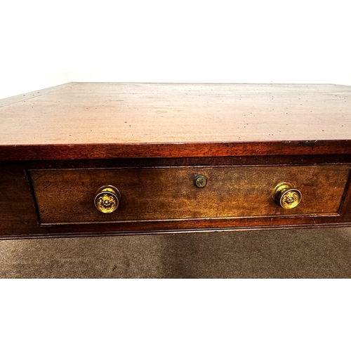 20 - A George III mahogany rectangular Library/ dining table, circa 1800, the oblong top (loose) with cle... 