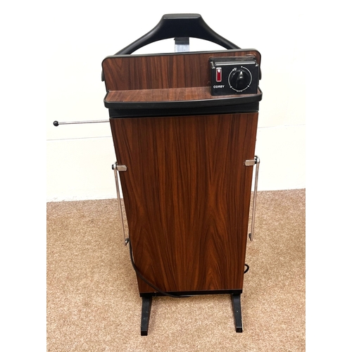 24 - Various, including a modern green upholstered armchair; together with another chair and a Corby trou... 