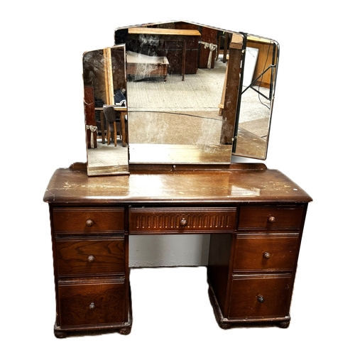 26 - Two modern veneered dressing tables, each with mirrors and a trouser press (3).Darker; 73cm high, 12... 