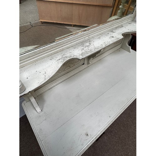 27 - A late Victorian mirror backed sideboard, later painted white, with arrangement of drawers and cabin... 