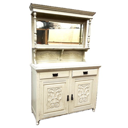 27 - A late Victorian mirror backed sideboard, later painted white, with arrangement of drawers and cabin... 