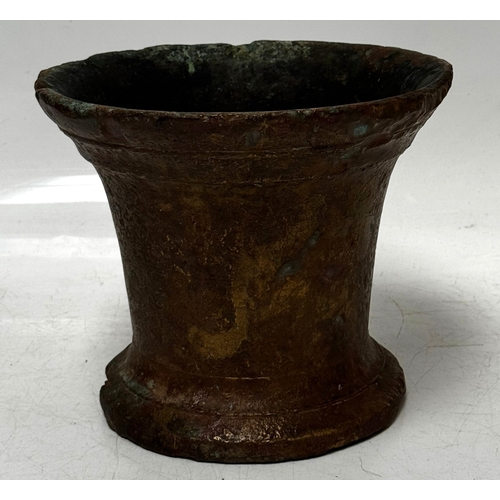 28 - A large bronze 17th century Mortar, probably English, of typical waisted form, plain including sligh... 