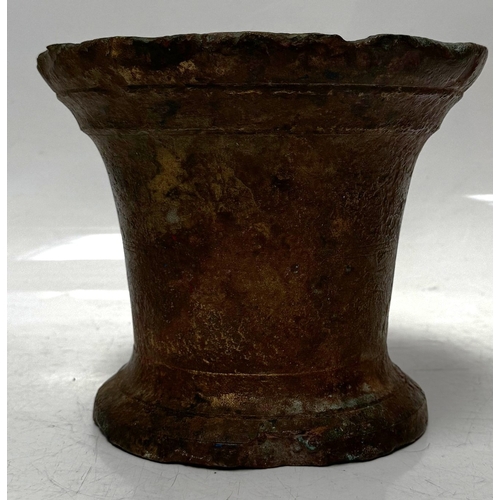 28 - A large bronze 17th century Mortar, probably English, of typical waisted form, plain including sligh... 