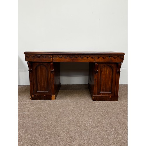 30 - A Victorian mahogany twin pedestal writing desk, circa 1840, with plain rectangular top, moulded apr... 