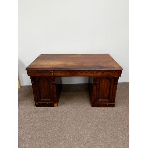 30 - A Victorian mahogany twin pedestal writing desk, circa 1840, with plain rectangular top, moulded apr... 
