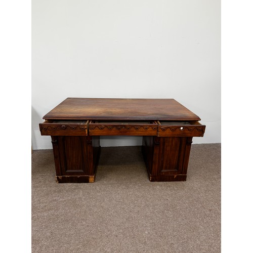 30 - A Victorian mahogany twin pedestal writing desk, circa 1840, with plain rectangular top, moulded apr... 