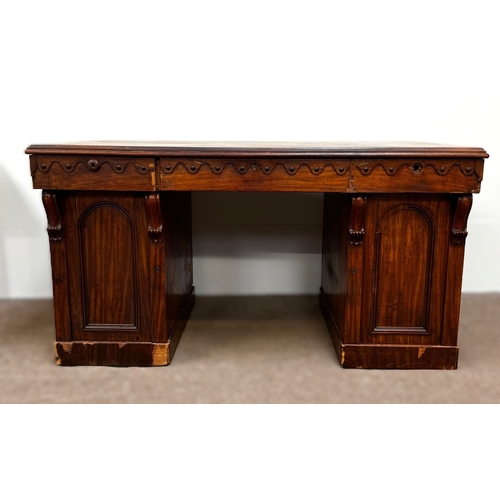 30 - A Victorian mahogany twin pedestal writing desk, circa 1840, with plain rectangular top, moulded apr... 