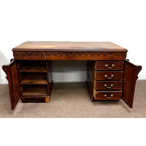 30 - A Victorian mahogany twin pedestal writing desk, circa 1840, with plain rectangular top, moulded apr... 