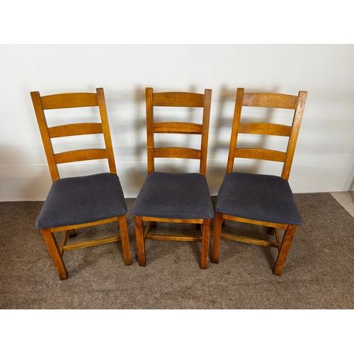 33 - Two modern café/ bar dining tables, together with seven ladder back chairs (9).