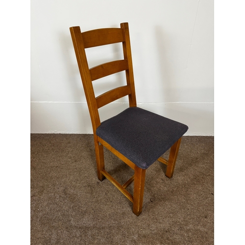 33 - Two modern café/ bar dining tables, together with seven ladder back chairs (9).