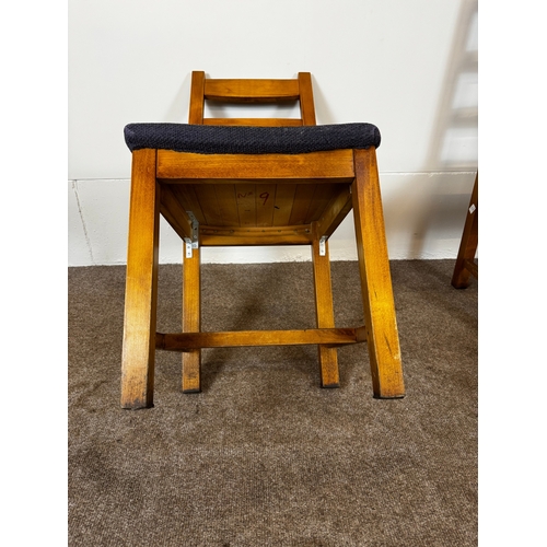 33 - Two modern café/ bar dining tables, together with seven ladder back chairs (9).