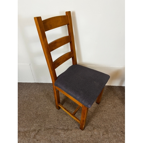 33 - Two modern café/ bar dining tables, together with seven ladder back chairs (9).