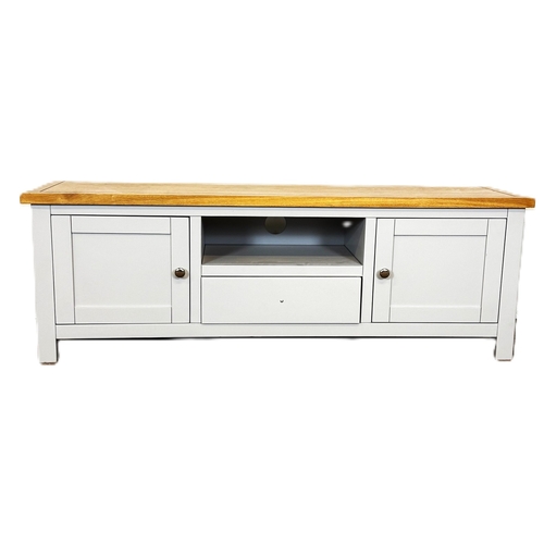 39 - A modern painted light grey television stand; 48cm high, 140cm width, 35cm depth.