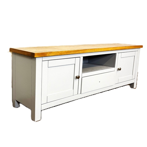 39 - A modern painted light grey television stand; 48cm high, 140cm width, 35cm depth.