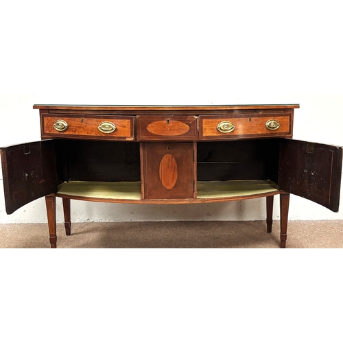40 - A Regency style mahogany bow-fronted sideboard, 19th century, with later glass top; 94cm high, 160cm... 