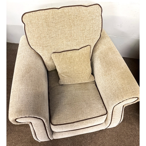 41 - A pair of modern deep and cushioned armchairs; 72cm high at frame/ 97cm high (inc cushion), 99cm wid... 