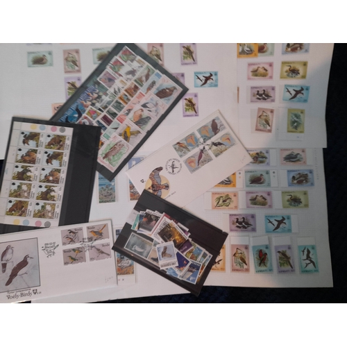 12 - Stamps : BIRDS fine accumulation in 2 Albums, Stockbook, on pages and loose. A very fine lot with 10... 