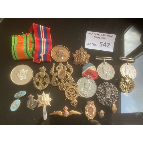 542 - Collectables : Militaria - WWII medals along with other cap badges pins buttons etc