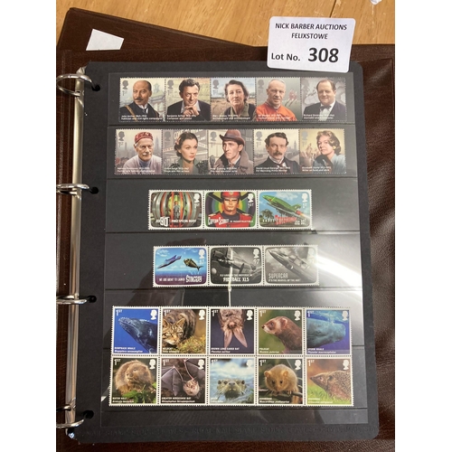 308 - Stamps : Cased Royal Mail Universal album containing modern mint GB stamps FV £436