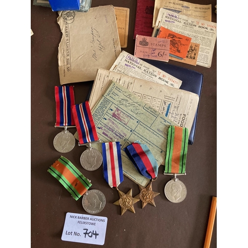 704 - Collectables : Militaria - nice collection of WWII medals, along with various ephemera ration books ... 