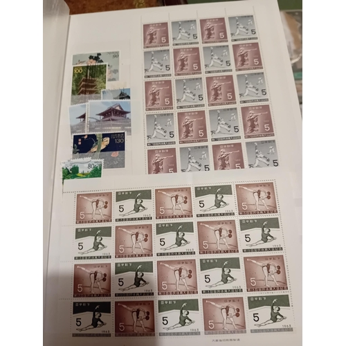 55 - Stamps : JAPAN  Two Stock books one has Defs  from c 1945 both M & U - the other Qty of  Commems & M... 