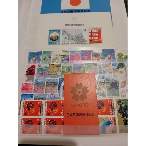 55 - Stamps : JAPAN  Two Stock books one has Defs  from c 1945 both M & U - the other Qty of  Commems & M... 