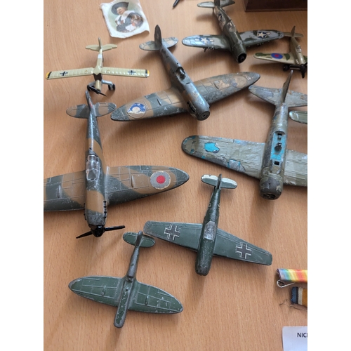 330 - Diecast: Assortment of diecast planes including Dinky, Matchbox and others; varying conditions; plus... 