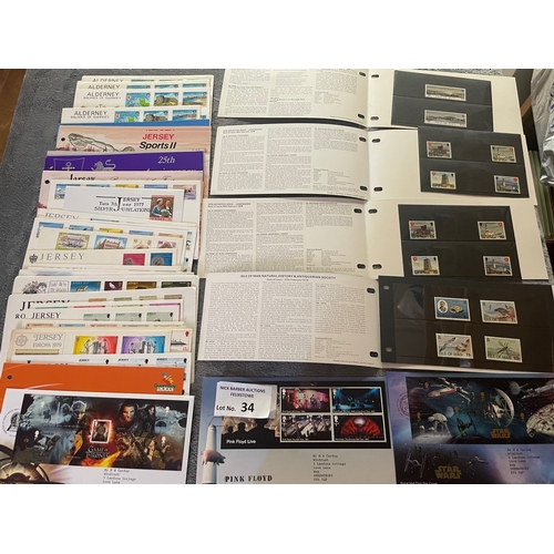 34 - Stamps: Channel Islands collection in Davo, along with a good batch of presentation packs.