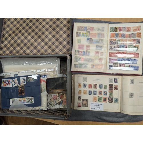 51 - Stamps: Suitcase of stamp material, mostly loose in packets, plus a few albums.