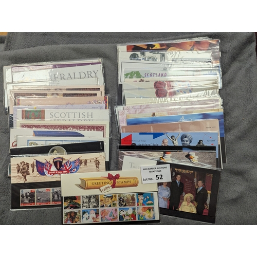 52 - Stamps: Collection of GB mint stamp presentation packs with a FV of £224.78.