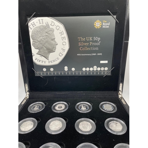 265 - Coins: Royal Mint UK 50p Silver Proof collection; 40th anniversary 1969-2009, 16 coins including Kew... 