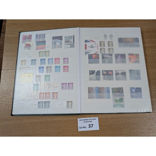 37 - Stamps: GB Mint definitives and commemoratives in stockbook; 1999 onwards; FV 400+.