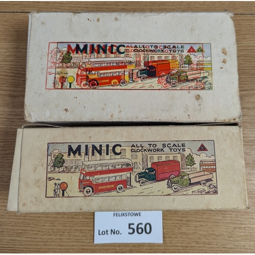 560 - Diecast: Tri-ang Minic pair, including D.D. Bus 'Ovaltine' (missing key, appears to not work); and D... 