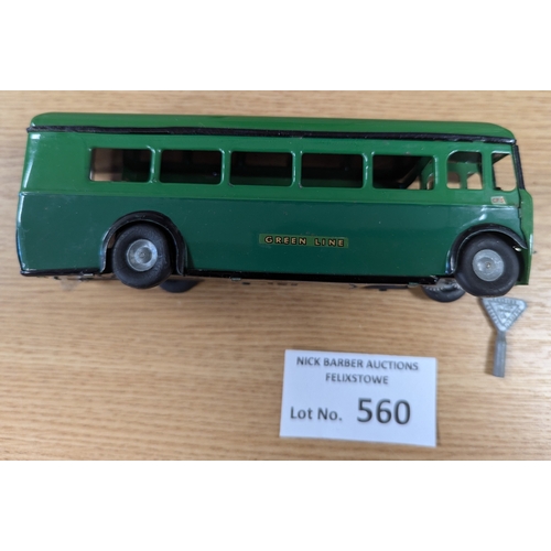 560 - Diecast: Tri-ang Minic pair, including D.D. Bus 'Ovaltine' (missing key, appears to not work); and D... 