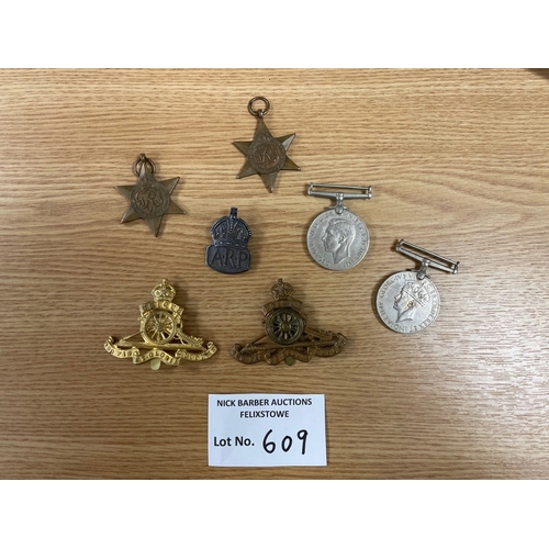 609 - Collectables; Militaria: Assortment of WW2 medals, badges, etc.