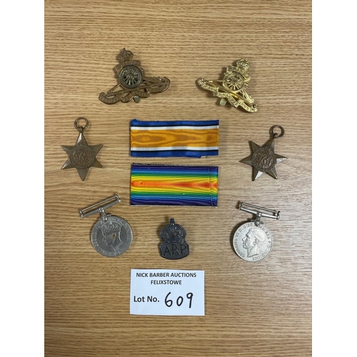 609 - Collectables; Militaria: Assortment of WW2 medals, badges, etc.