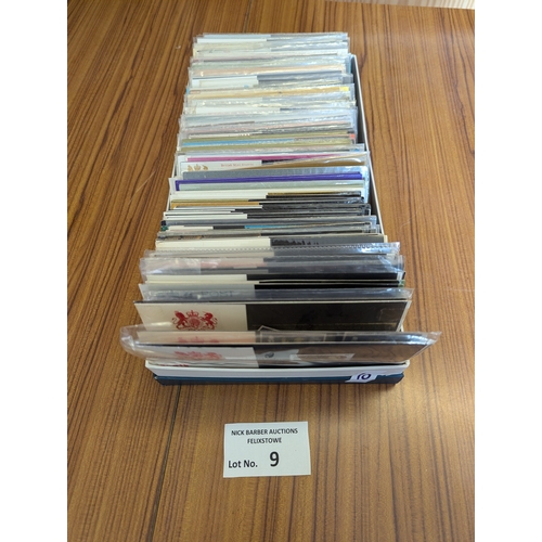 9 - Stamps: 140 UK stamp presentation packs (approx 50 pre-decimal).