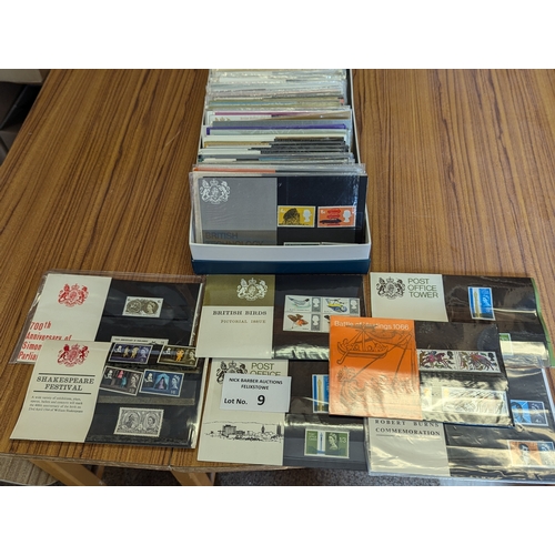 9 - Stamps: 140 UK stamp presentation packs (approx 50 pre-decimal).