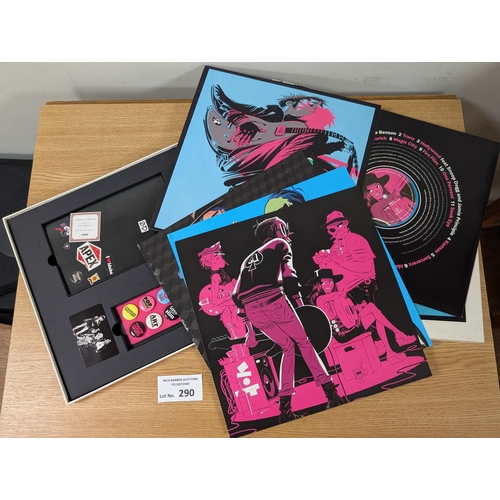 290 - Records: Pair of vinyl box sets, including Gorillaz The Now Now 0190295643416, opened, some scuffs t... 