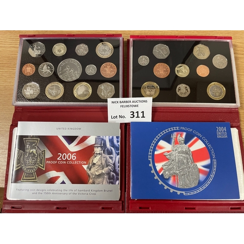 311 - Coins: Royal Mint deluxe proof coin sets, boxed; 2004 and 2006; Fine conditions.