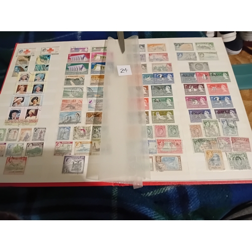 24 - Stamps : British Colonials in stock book to top value either mint/used Rhodesia (2), British Solomon... 