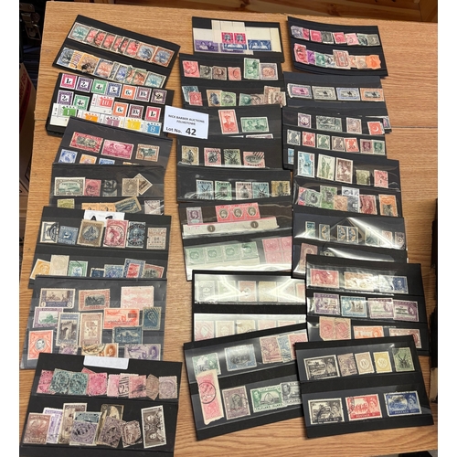 42 - Stamps : Random mix of collectable stamps on nearly 200 stock cards. Some old auction lots. Lots of ... 