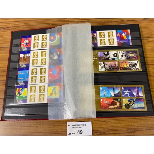 49 - Stamps : Three stock books of mostly modern mint GB. Album 1 has a FV of £416.70, Album 2 has a FV/S... 