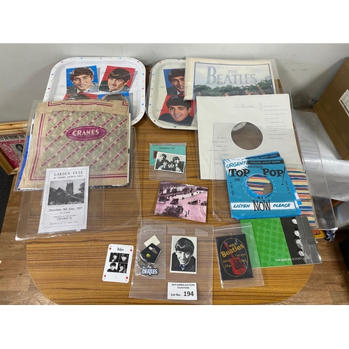 194 - Records : Beatles memorabilia including various items, carrier bags, tea trays (tin) x 2 and other i... 