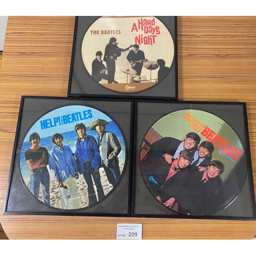 209 - Records : Beatles - 3 rare picture discs in glass frames, 2 x German, 1 x Japanese.