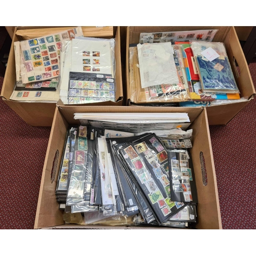 15 - WORLDWIDE ACCUMULATION; Three large archive boxes of ex dealer's stock of stamps in priced packets &... 